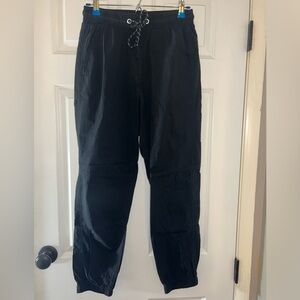 pacsun black parachute windbreaker pants. Size S.